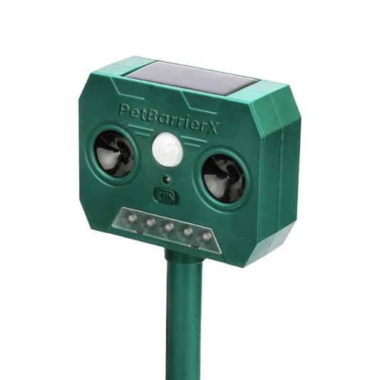 Green PetBarrierX pet repeller device on a white background